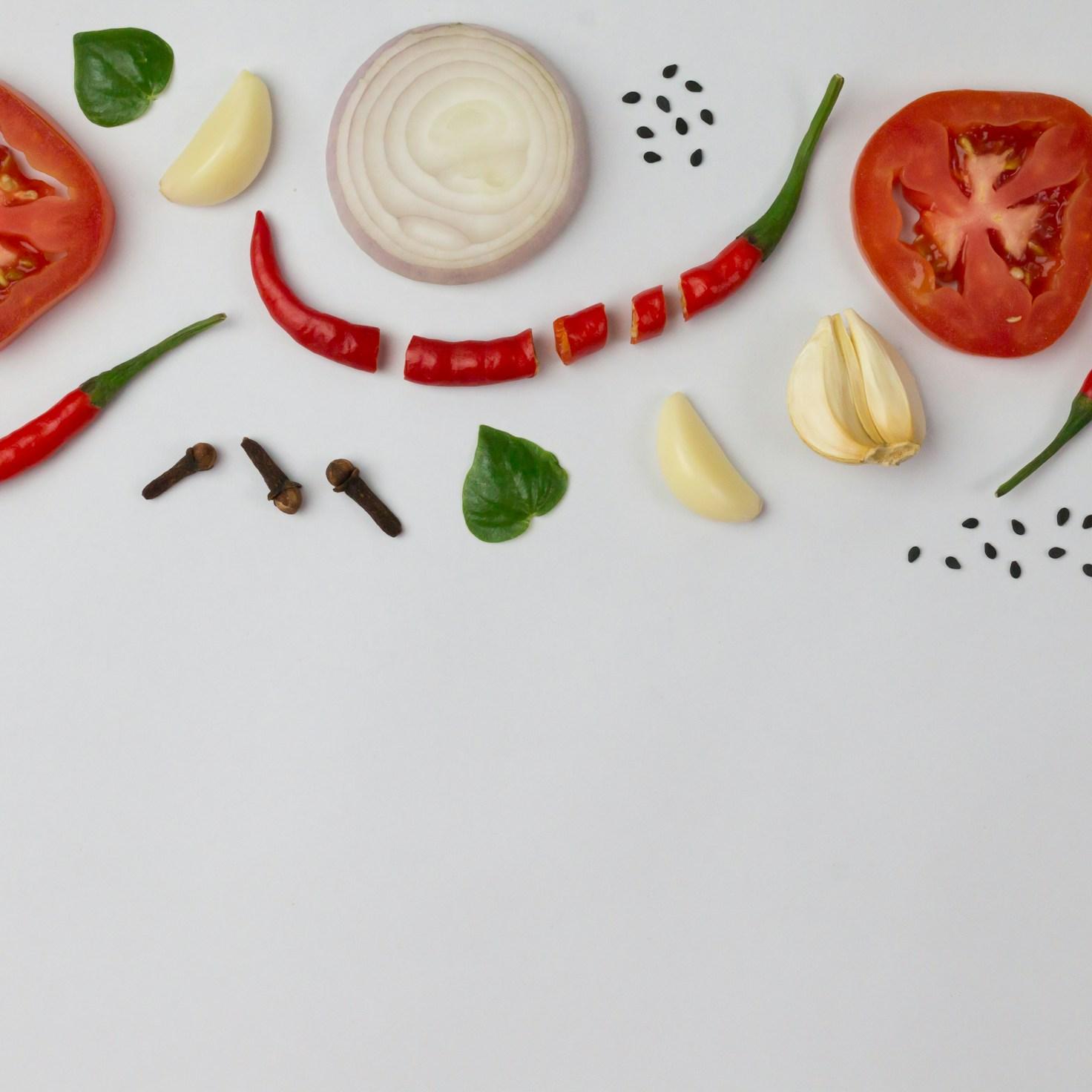 Community members collaborating in a contemporary kitchen space, sharing recipes and cooking techniques